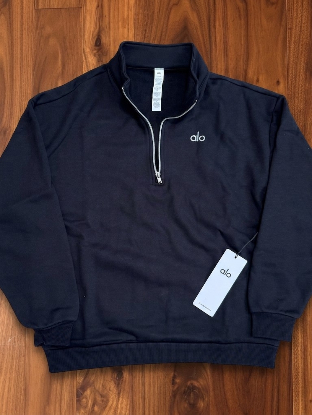 ALO Yoga Men’s Black Half-Zip Sweater with Silver Trim